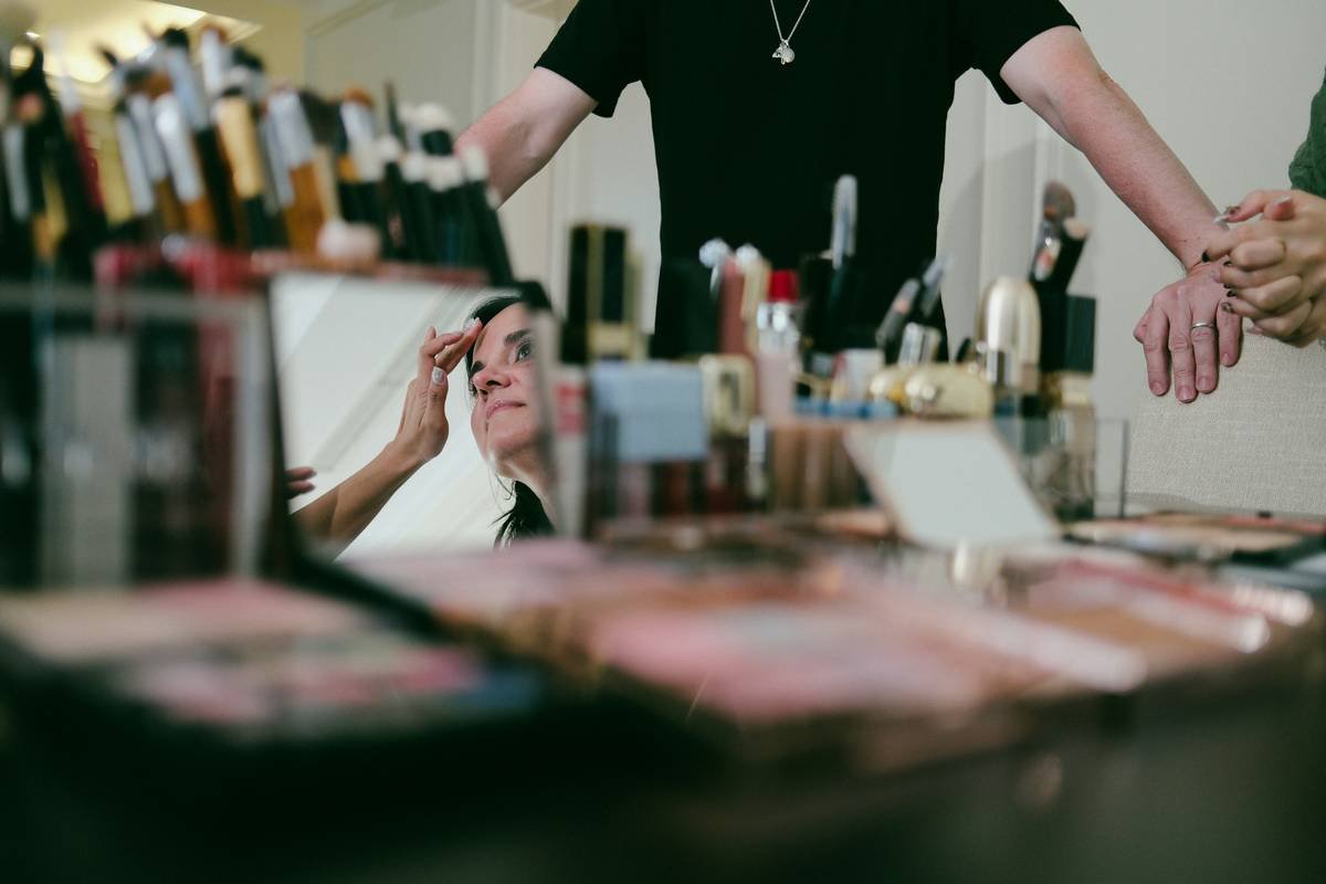 A close-up image showing the process of blending prosthetic edges with liquid latex