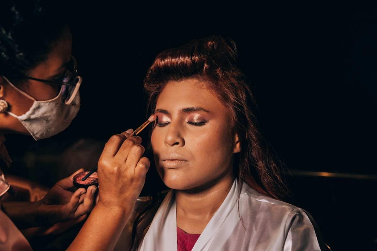 After: The same person with detailed prosthetic makeup