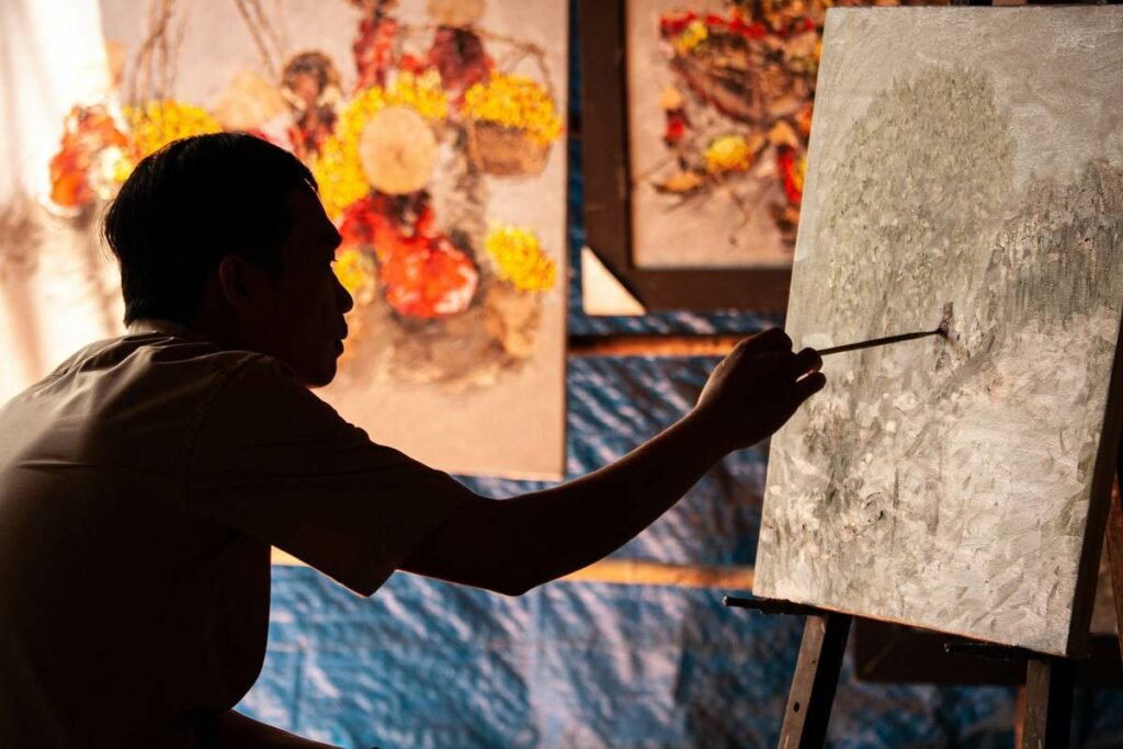 a person painting on a wall