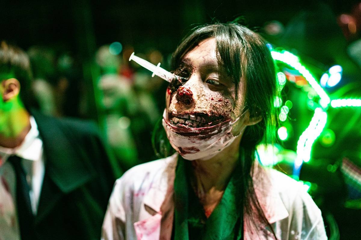 Close-up of advanced makeup for zombies showing layered prosthetics and realistic tissue decay